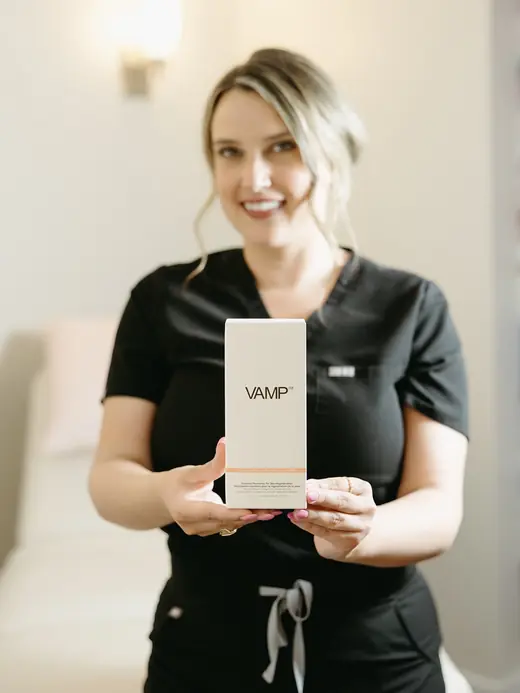 Marley holding a skin care product box
