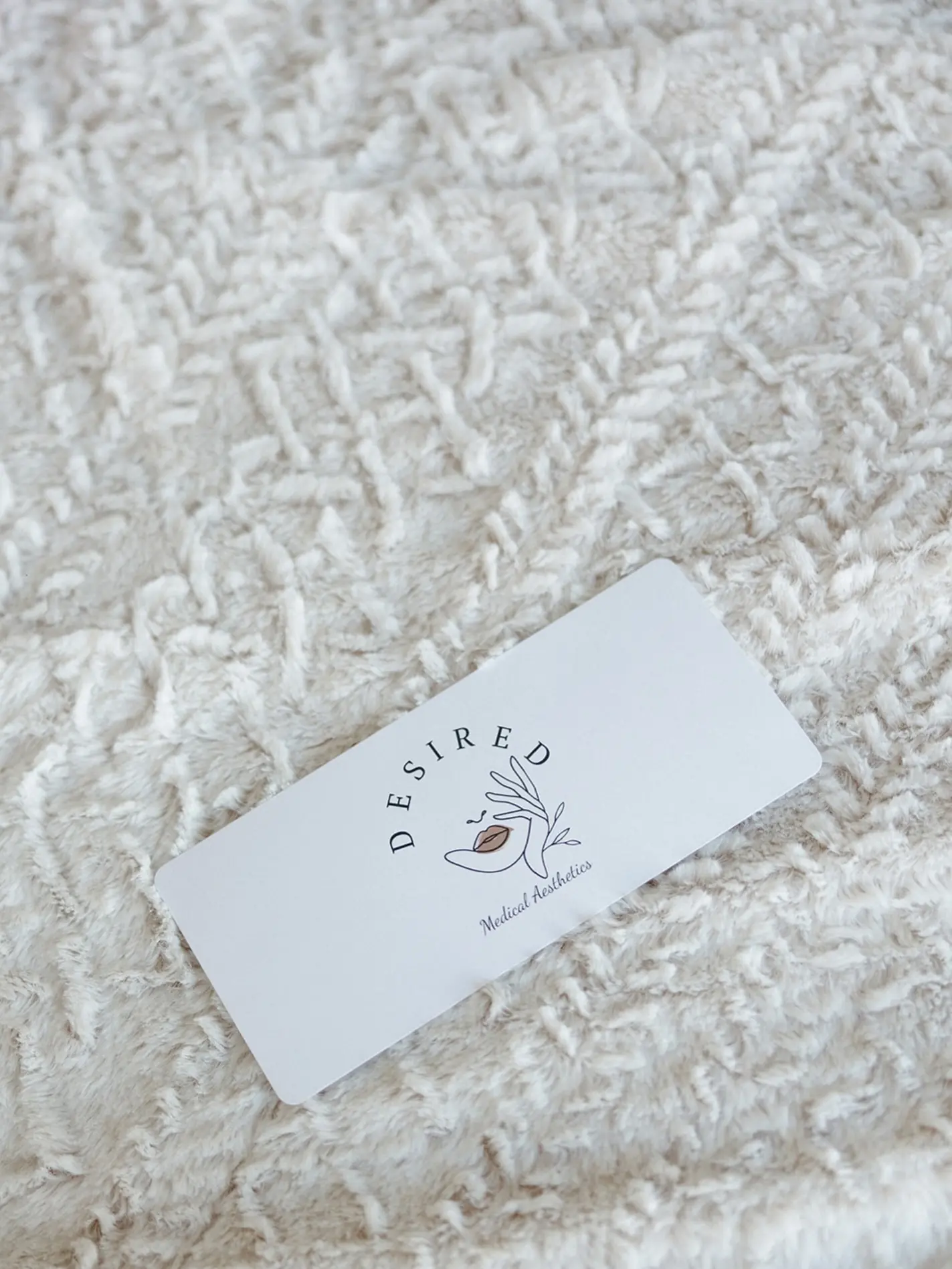 Desired gift card on a soft blanket