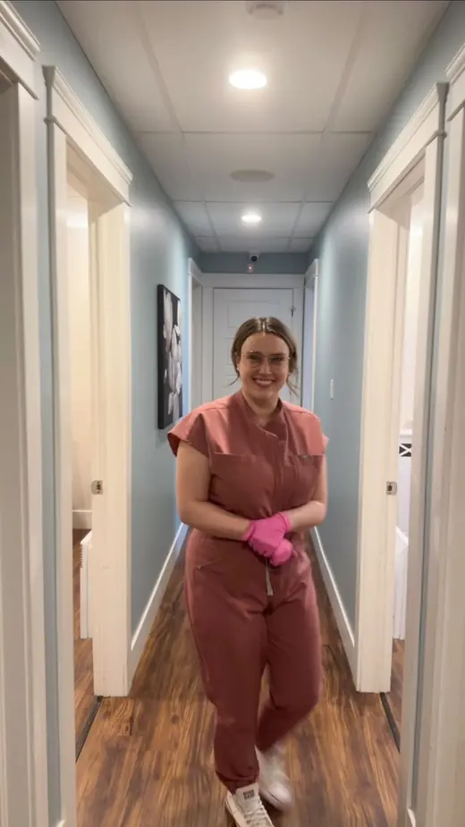 Marley walking down the clinic hallway